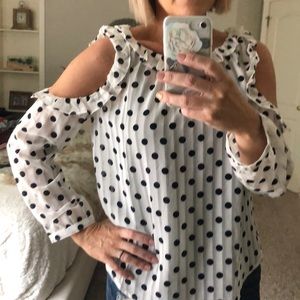 White and navy polka dot blouse